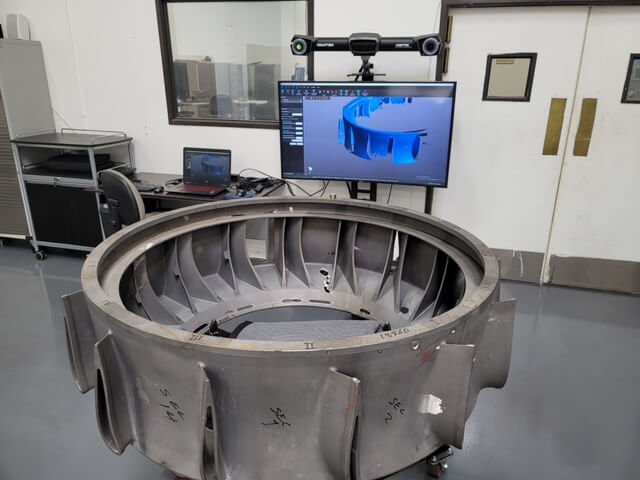 Large Machined Part Being 3D Scanned in Large Lab
